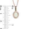 Thumbnail Image 1 of EFFY™ Collection Oval Opal and 1/8 CT. T.W. Champagne and White Diamond Frame Drop Pendant in 14K Rose Gold