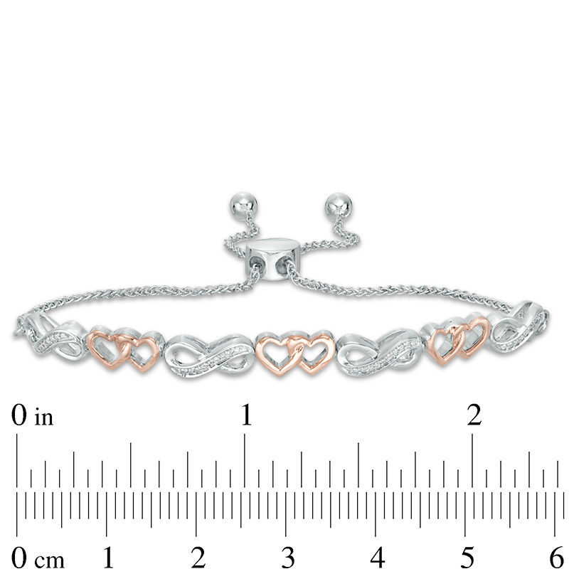 1/20 CT. T.W. Diamond Double Heart Infinity Alternating Bolo Bracelet in Sterling Silver and 10K Rose Gold - 9.5"