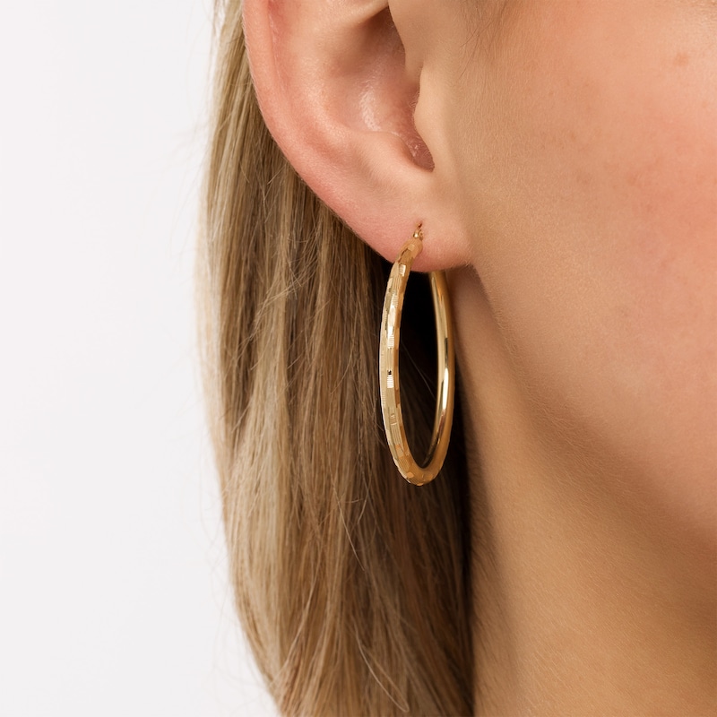 40.0 x 3.0mm Diamond-Cut Basket Weave Tube Hoop Earrings in 10K Gold