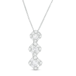 1/2 CT. T.W. Baguette and Round Diamond Frame Graduated Three Stone Pendant in 10K White Gold