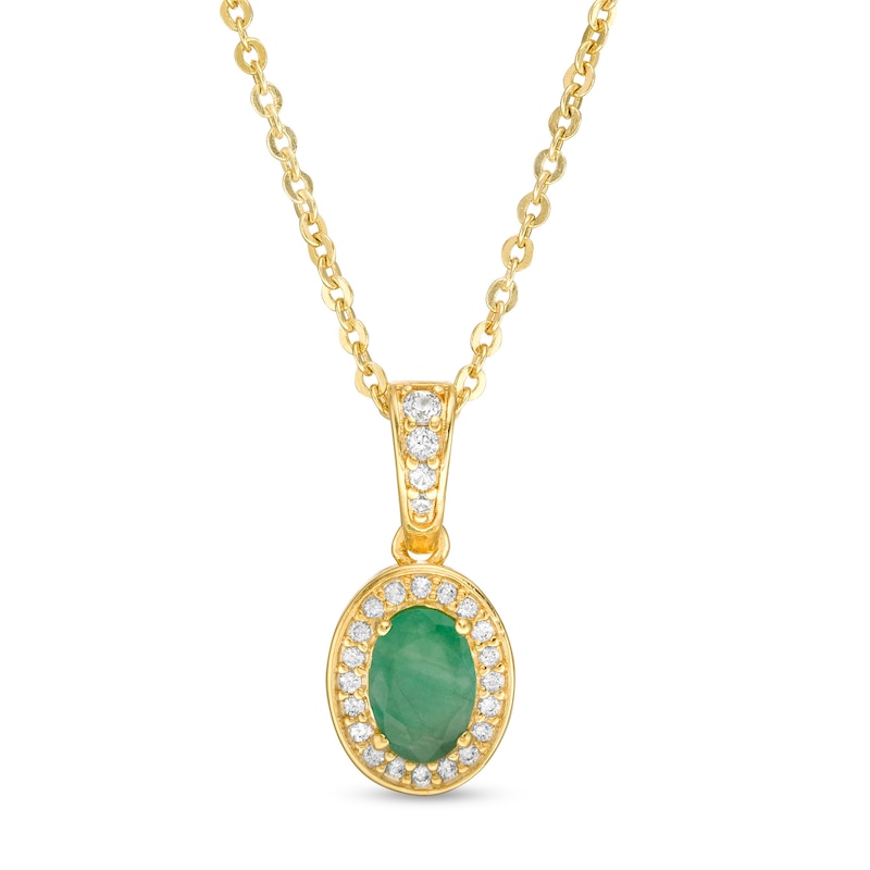 Oval Emerald and 1/8 CT. T.W. Diamond Frame Pendant in 10K Gold