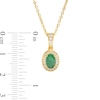 Thumbnail Image 1 of Oval Emerald and 1/8 CT. T.W. Diamond Frame Pendant in 10K Gold