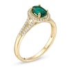 Thumbnail Image 1 of Oval Emerald and 1/8 CT. T.W. Diamond Frame Split Shank Ring in 10K Gold