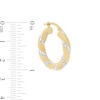Thumbnail Image 1 of Made in Italy Diamond-Cut Ribbon Wrapped Tube Hoop Earrings in 14K Two-Tone Gold