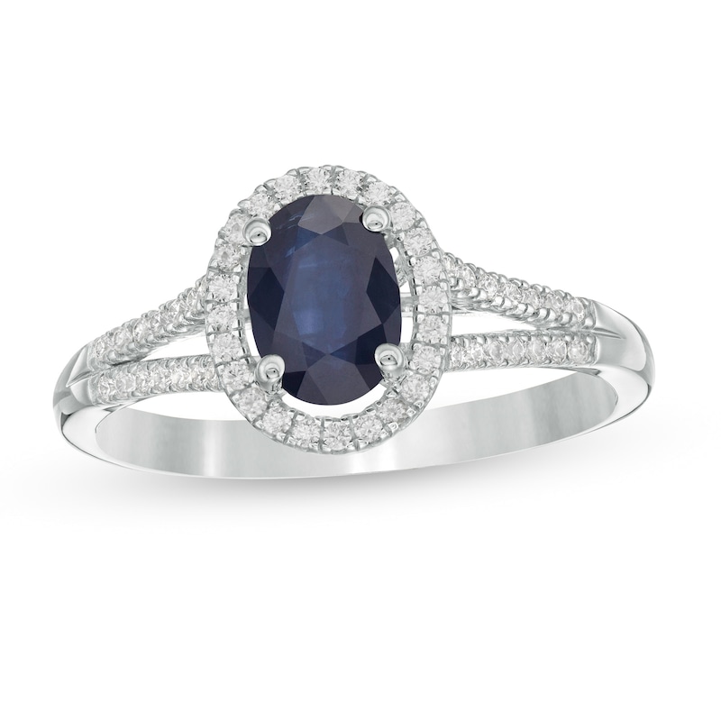Oval Blue Sapphire and 1/8 CT. T.W. Diamond Frame Split Shank Ring in 10K White Gold