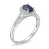 Thumbnail Image 1 of Oval Blue Sapphire and 1/8 CT. T.W. Diamond Frame Split Shank Ring in 10K White Gold