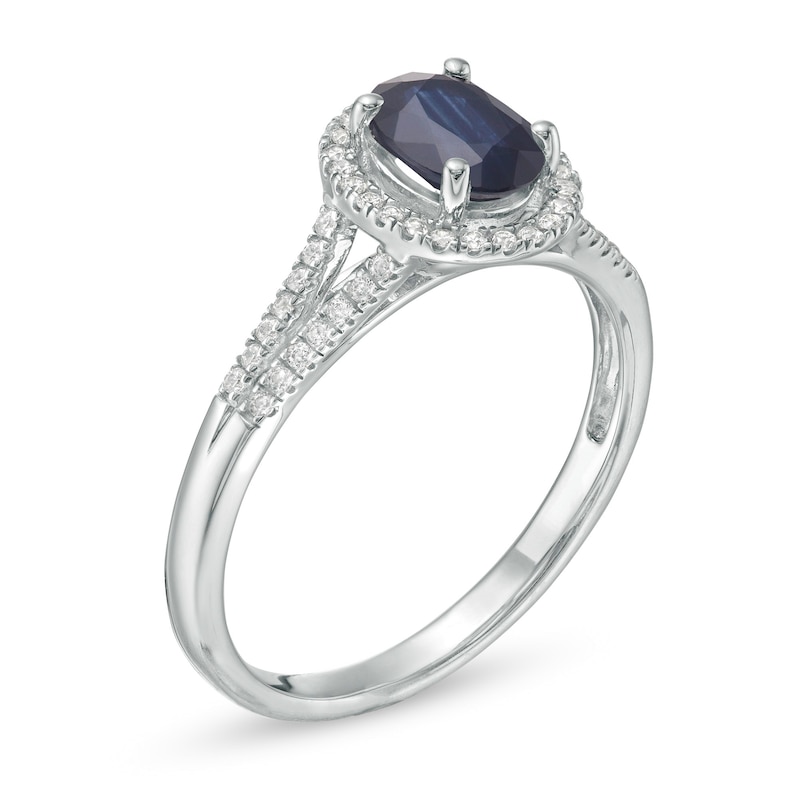 Oval Blue Sapphire and 1/8 CT. T.W. Diamond Frame Split Shank Ring in 10K White Gold