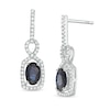 Thumbnail Image 1 of Oval Blue Sapphire and 1/5 CT. T.W. Diamond Twist Frame Drop Earrings in 10K White Gold