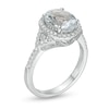Thumbnail Image 2 of Oval Aquamarine and 1/4 CT. T.W. Diamond Frame Split Shank Ring in 10K White Gold