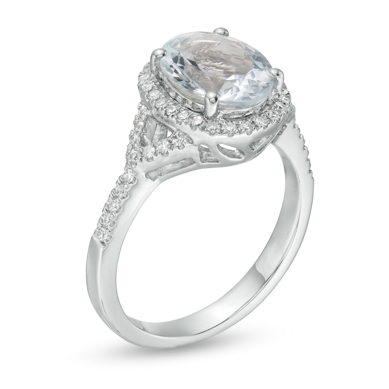 Main Image 2 of Oval Aquamarine and 1/4 CT. T.W. Diamond Frame Split Shank Ring in 10K White Gold