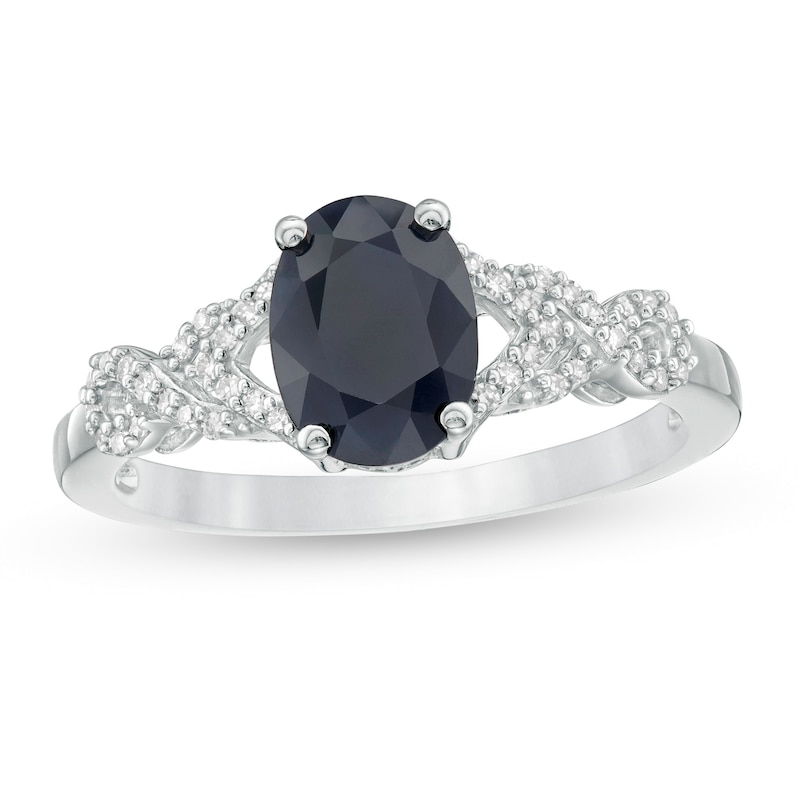 Oval Blue Sapphire and 1/10 CT. T.W. Diamond Twist Shank Ring in 10K White Gold