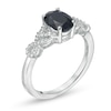 Thumbnail Image 1 of Oval Blue Sapphire and 1/10 CT. T.W. Diamond Twist Shank Ring in 10K White Gold