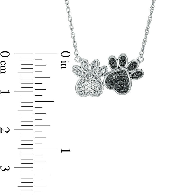 1/20 CT. T.W. Enhanced Black and White Diamond Double Paw Print Necklace in Sterling Silver