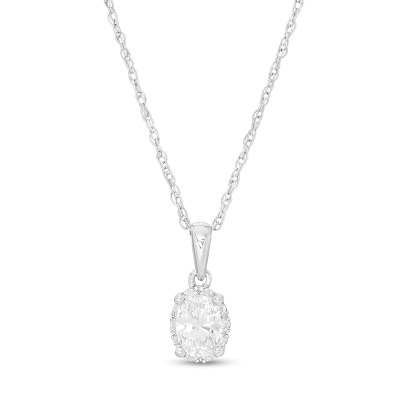 Main Image 1 of 5/8 CT. T.W. Certified Canadian Oval Diamond Frame Pendant in 14K White Gold (I/SI2)