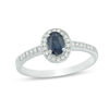 Thumbnail Image 1 of Oval Blue Sapphire and 1/8 CT. T.W. Diamond Frame Engagement Ring in 14K White Gold
