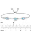 Thumbnail Image 2 of Sideways Oval Swiss Blue Topaz and Lab-Created White Sapphire Frame Three Stone Bolo Bracelet in Sterling Silver - 9.5"