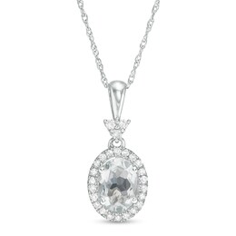 Oval Aquamarine and 1/10 CT. T.W. Diamond Frame Pendant in 10K White Gold