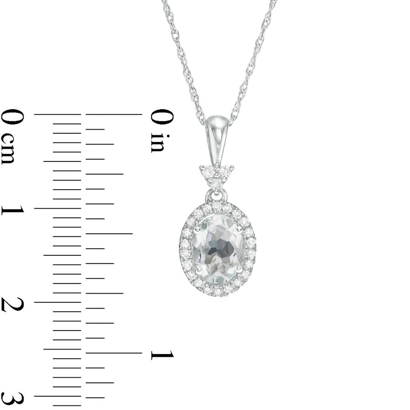 Main Image 2 of Oval Aquamarine and 1/10 CT. T.W. Diamond Frame Pendant in 10K White Gold