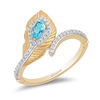 Thumbnail Image 0 of Enchanted Disney Jasmine Pear-Shaped Blue Topaz and 1/6 CT. T.W. Diamond Peacock Feather Bypass Wrap Ring in 10K Gold