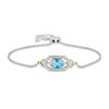 Thumbnail Image 0 of Enchanted Disney Jasmine Oval Blue Topaz and 1/5 CT. T.W. Diamond Bolo Bracelet in Sterling Silver and 10K Gold - 8.5"