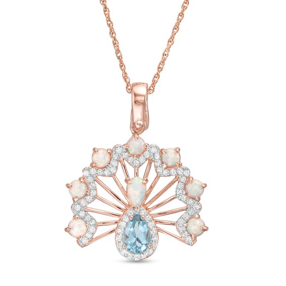 baby blue chalcedony drop and three polished green agate drops below rope-style vermeil ring with polished oval sapphire Large polished