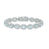 Thumbnail Image 1 of Oval Sky Blue Topaz and Diamond Accent Beaded Frame Vintage-Style Bracelet in Sterling Silver - 7.25"