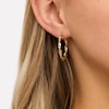 30.0 x 3.0mm Diamond-Cut Twisted Ribbon Tube Hoop Earrings in 10K Gold
