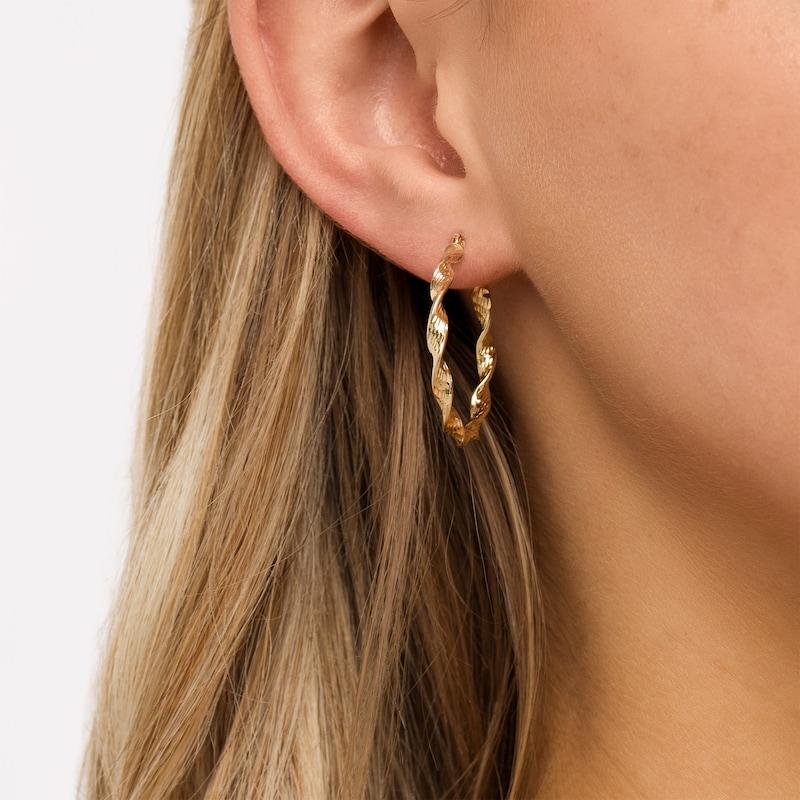 30.0 x 3.0mm Diamond-Cut Twisted Ribbon Tube Hoop Earrings in 10K Gold