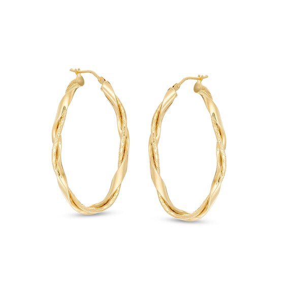 Made in Italy Multi-Finish Ribbon Twist Oval Hoop Earrings in 14K Gold Made in Italy Multi-Finish Ribbon Twist Oval Hoop Earrings in 14K Gold