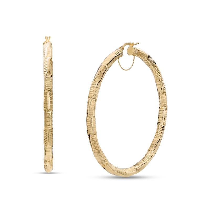 Main Image 1 of Made in Italy 4.0mm Diamond-Cut Art Deco Pattern Tube Hoop Earrings in 14K Gold