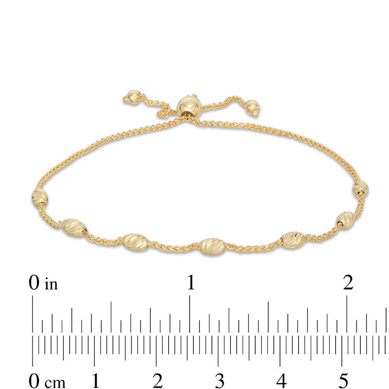 Diamond-Cut Barrel Bead Station Bolo Bracelet in 10K Gold - 9"