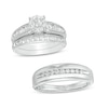 Thumbnail Image 0 of 1-1/6 CT. T.W. Diamond Frame Wedding Ensemble in 10K White Gold - Size 7 and 10.5