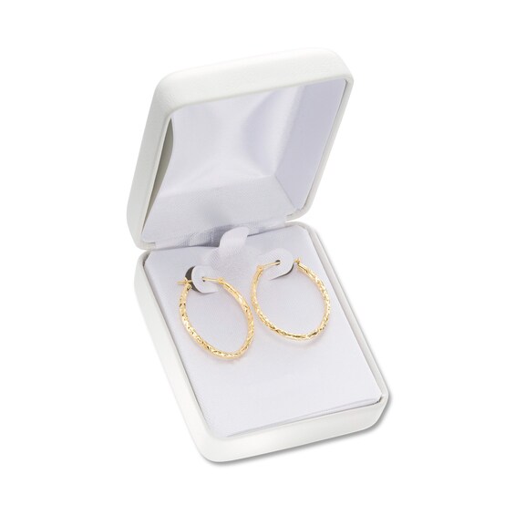 2.0 x 25.0mm Diamond-Cut Oval Tube Hoop Earrings in 14K Gold 2.0 x 25.0mm Diamond-Cut Oval Tube Hoop Earrings in 14K Gold