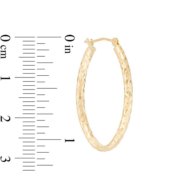 2.0 x 25.0mm Diamond-Cut Oval Tube Hoop Earrings in 14K Gold 2.0 x 25.0mm Diamond-Cut Oval Tube Hoop Earrings in 14K Gold