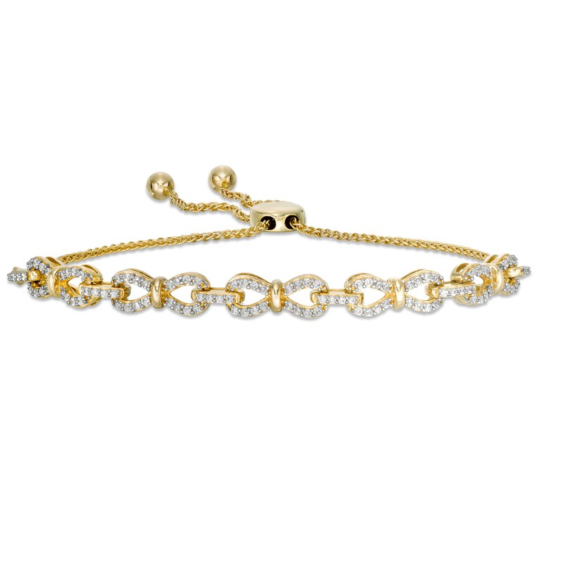 Main Image 1 of 1/2 CT. T.W. Diamond Bow Link Bolo Bracelet in 10K Gold - 9.5"