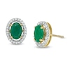 Thumbnail Image 0 of Oval Emerald and 1/8 CT. T.W. Diamond Frame Stud Earrings in 10K Gold