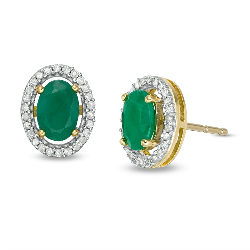 Main Image 1 of Oval Emerald and 1/8 CT. T.W. Diamond Frame Stud Earrings in 10K Gold