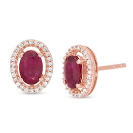 Oval Ruby and 1/8 CT. T.W. Diamond Frame Stud Earrings in 10K Rose Gold
