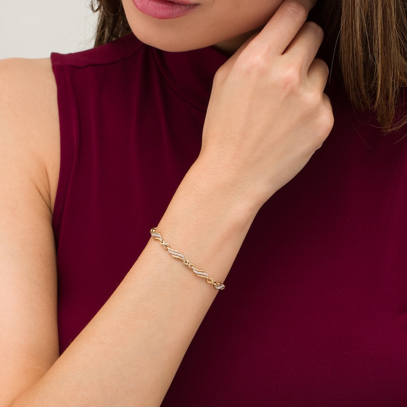 Main Image 2 of 1/4 CT. T.W. Diamond Alternating Infinity Bracelet in 10K Gold – 7.5"