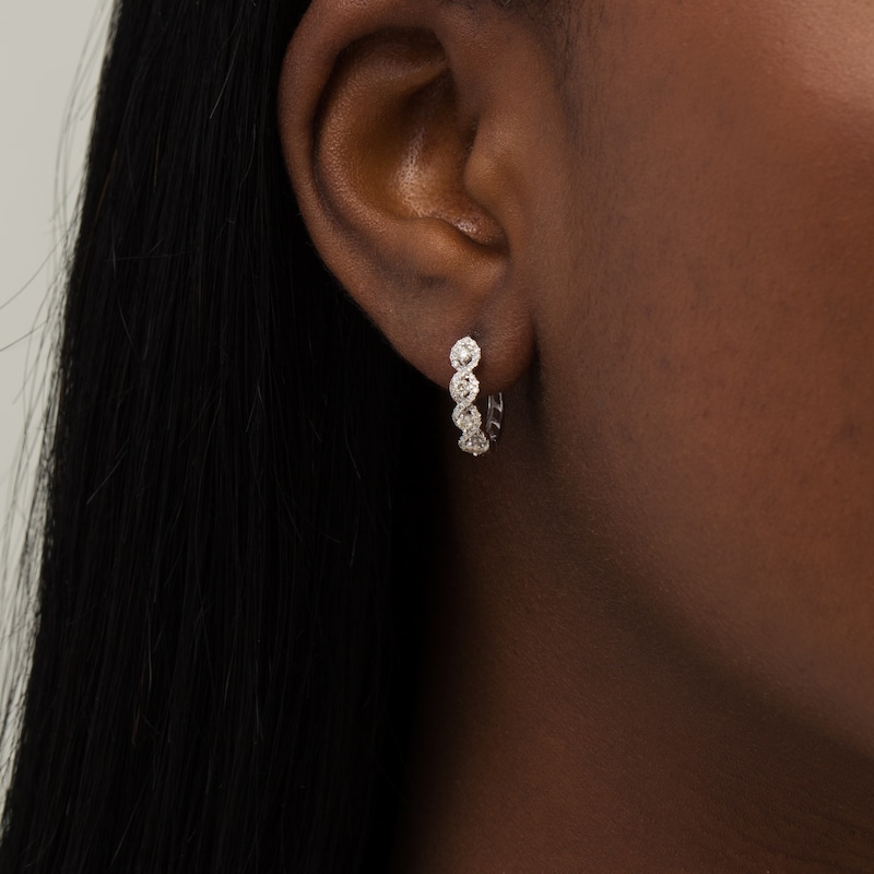 1/2 CT. T.W. Diamond Swirl Hoop Earrings in 10K White Gold
