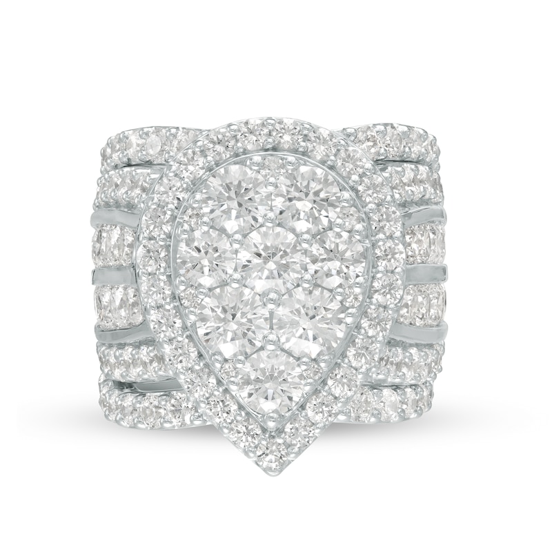 7 CT. T.W. Pear-Shaped Multi-Diamond Frame Multi-Row Three Piece Bridal Set in 14K White Gold