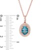 Thumbnail Image 2 of EFFY™ Collection Oval London Blue Topaz and 1/5 CT. T.W. Diamond Double Frame Drop Pendant in 14K Rose Gold