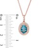 Thumbnail Image 1 of EFFY™ Collection Oval London Blue Topaz and 1/5 CT. T.W. Diamond Double Frame Drop Pendant in 14K Rose Gold