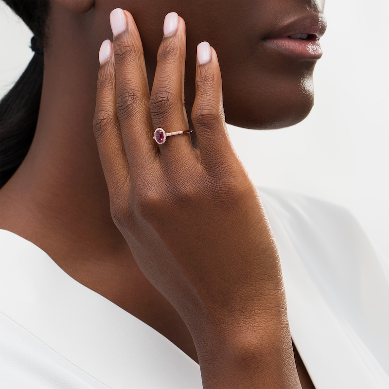 Main Image 2 of Oval Garnet and 1/10 CT. T.W. Diamond Frame Ring in 10K Rose Gold