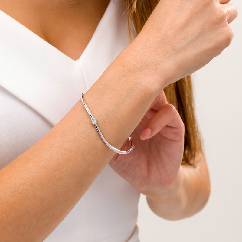 Main Image 3 of Marilyn Monroe™ Collection 1/15 CT. Diamond Solitaire Curved Bangle in Sterling Silver