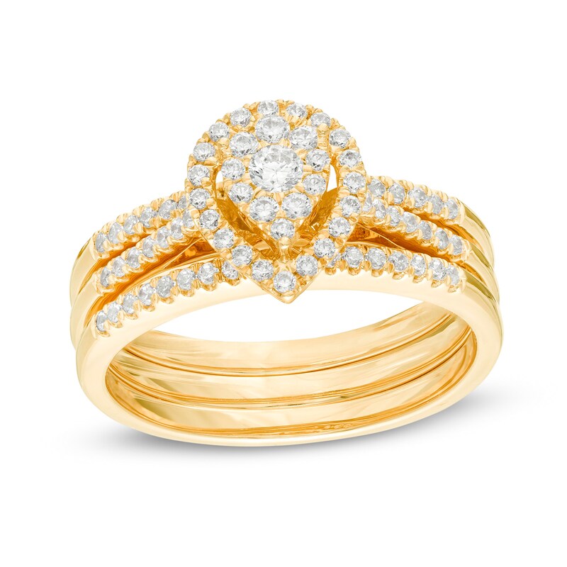 Main Image 1 of 1/2 CT. T.W. Composite Diamond Pear-Shaped Frame Three Piece Bridal Set in 10K Gold