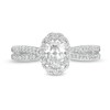 Thumbnail Image 4 of 3/4 CT. T.W. Certified Oval Diamond Frame Engagement Ring in 14K White Gold (I/I2)