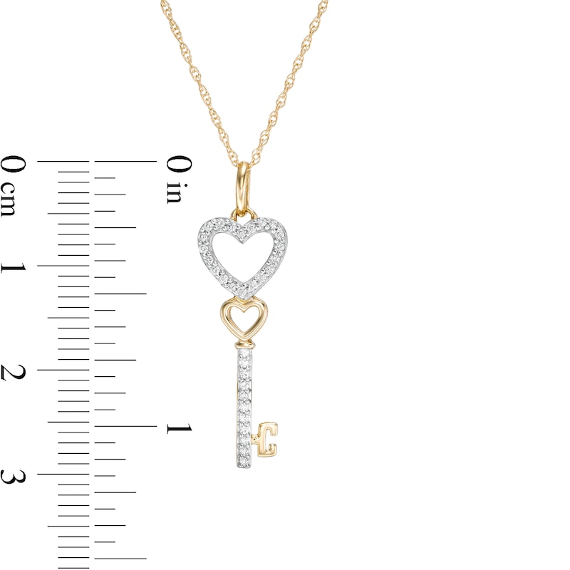 1/10 CT. T.W. Diamond Double Heart-Top Key Pendant in 10K Gold