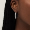 Thumbnail Image 2 of 1/20 CT. T.W. Diamond Hoop Earrings in Sterling Silver