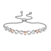 Thumbnail Image 1 of 1/20 CT. T.W. Diamond Alternating Infinity Heart Bolo Bracelet in Sterling Silver and 10K Rose Gold - 9.5